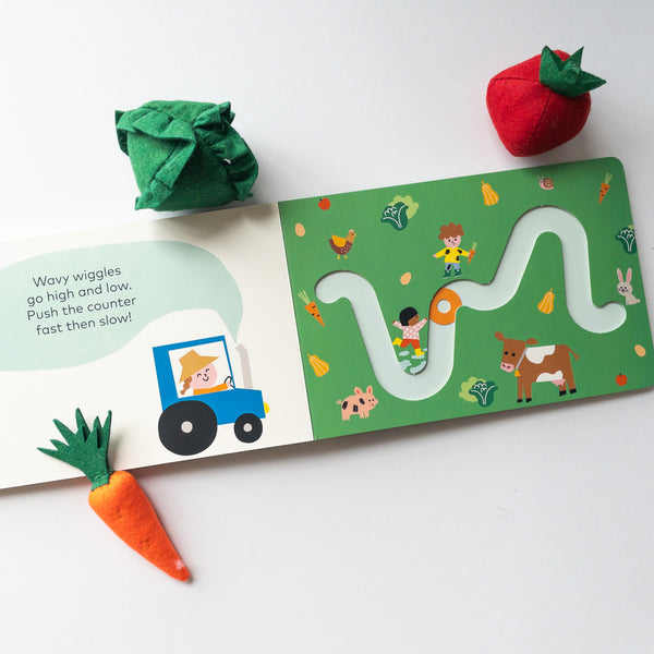 Waves and Wriggles: A moving-counter play book with early letter shapes